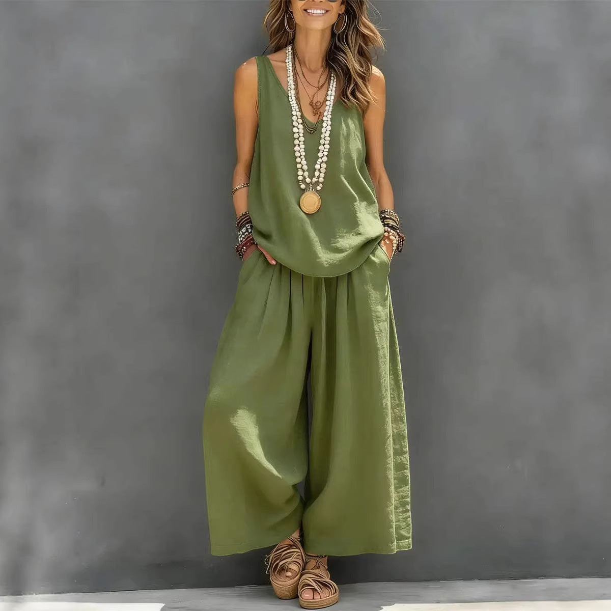  model wearing color green women's cotton linen tank and wide-leg pants set"