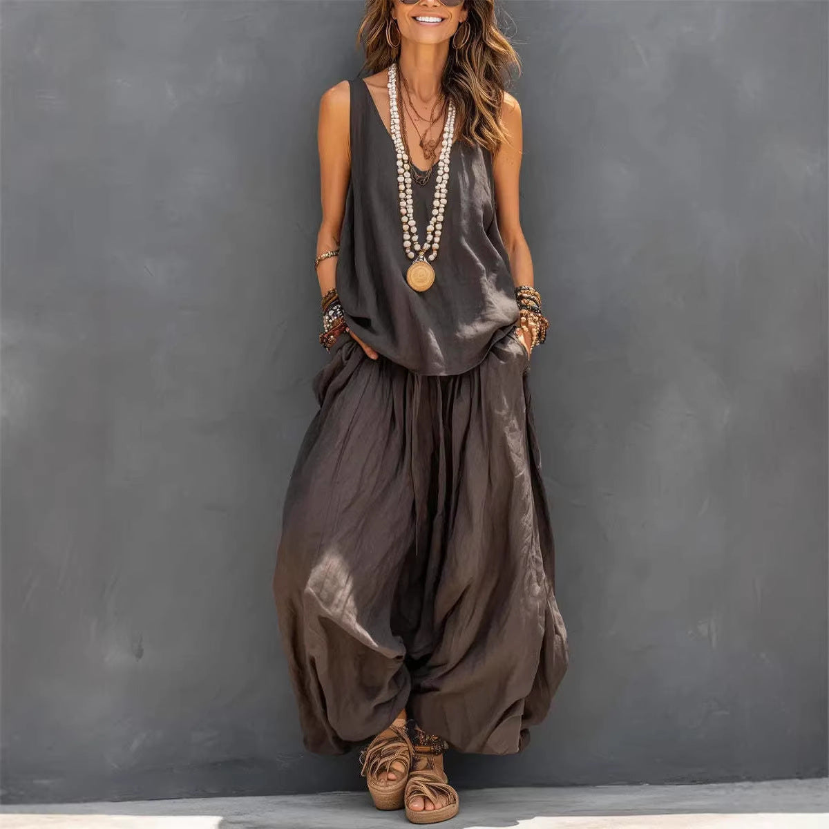  model wearing color dark brown women's cotton linen tank and wide-leg pants set"