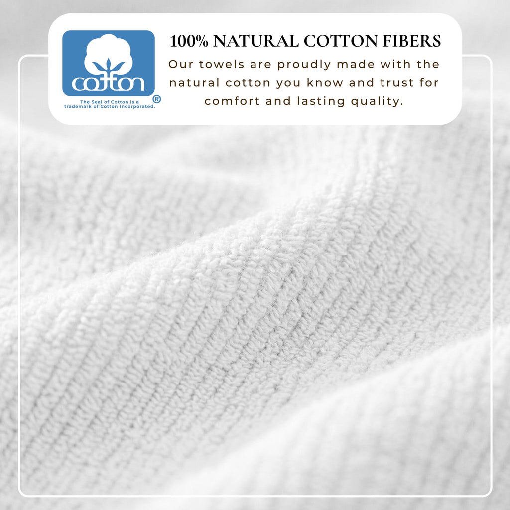 Close-up of white fabric with a label indicating 100% natural cotton fibers.